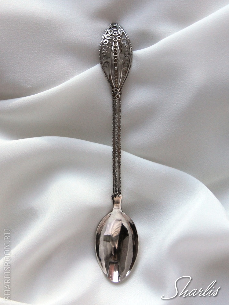 <b>Filigree technique similar to the silver lace embodied in the souvenir spoon</b><br />
 (Click to enlarge image)